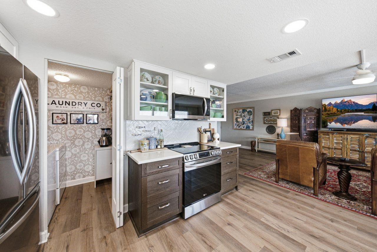 Laundry room is right of kitchen - 1655 S HIGHLAND AVE #I379, CLEARWATER