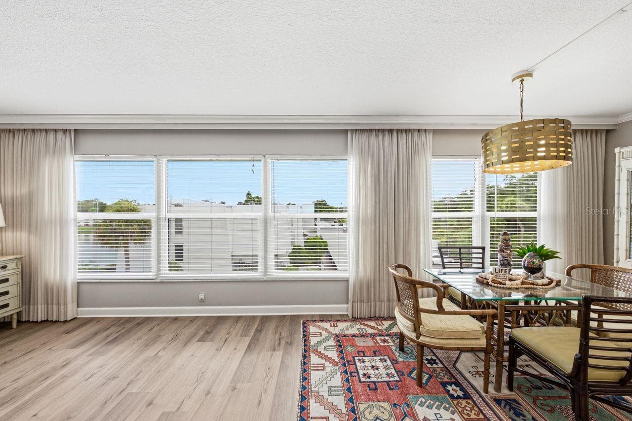 The south end is a wall of windows - 1655 S HIGHLAND AVE #I379, CLEARWATER