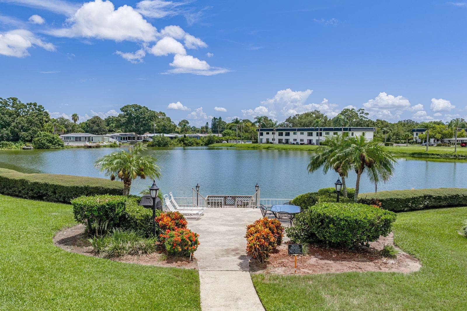 Beautiful landscape. This is steps from your door with sitting , BBQ and dock. - 1655 S HIGHLAND AVE #I379, CLEARWATER