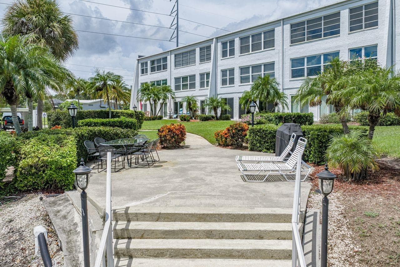 Your condo is a short few steps to a community sitting, BBQ and fishing dock - 1655 S HIGHLAND AVE #I379, CLEARWATER