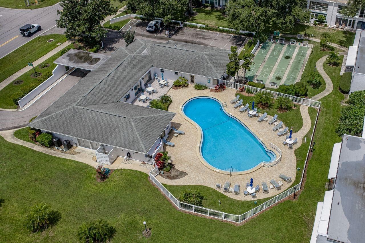 Community clubhouse, pool and Schuffleboard Courts - 1655 S HIGHLAND AVE #I379, CLEARWATER