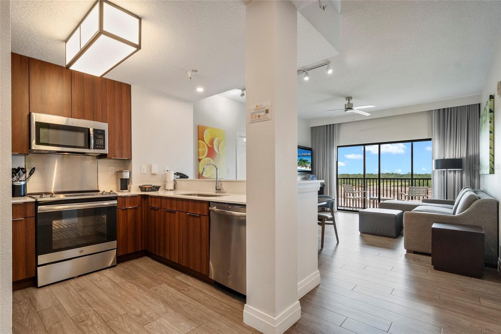 Open Kitchen/Living Area - 14501 GROVE RESORT AVE #2542, WINTER GARDEN