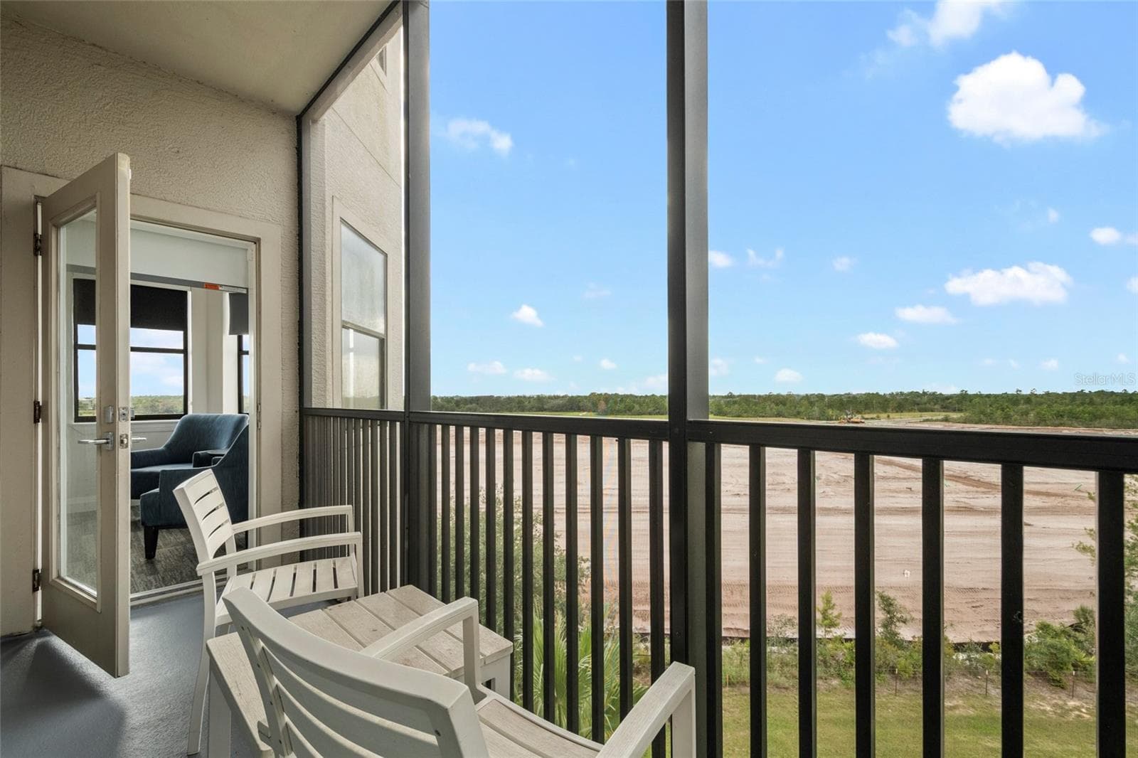 Balcony w/direct access to Primary Suite - 14501 GROVE RESORT AVE #2542, WINTER GARDEN