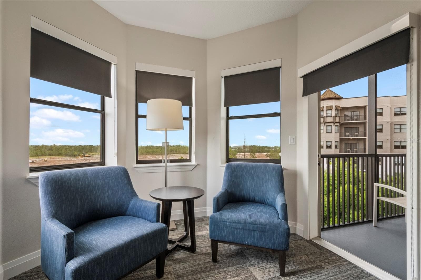 Primary Sitting Room w/direct balcony access - 14501 GROVE RESORT AVE #2542, WINTER GARDEN