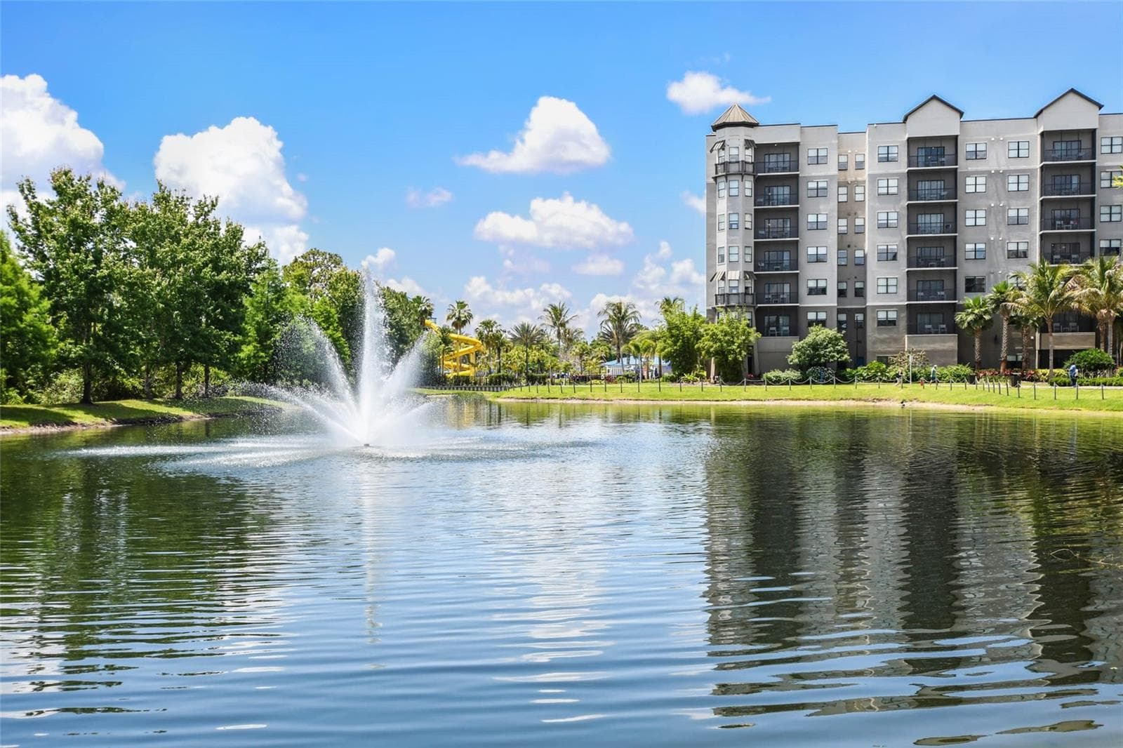 Serene grounds with fountains, pools, & lake views - 14501 GROVE RESORT AVE #2542, WINTER GARDEN