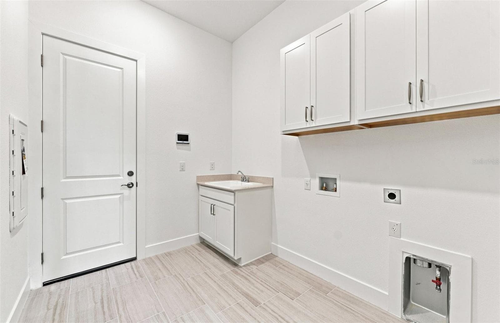 Laundry Room w/Built-in Cabinets - 17056 CANARY TRL, PARRISH