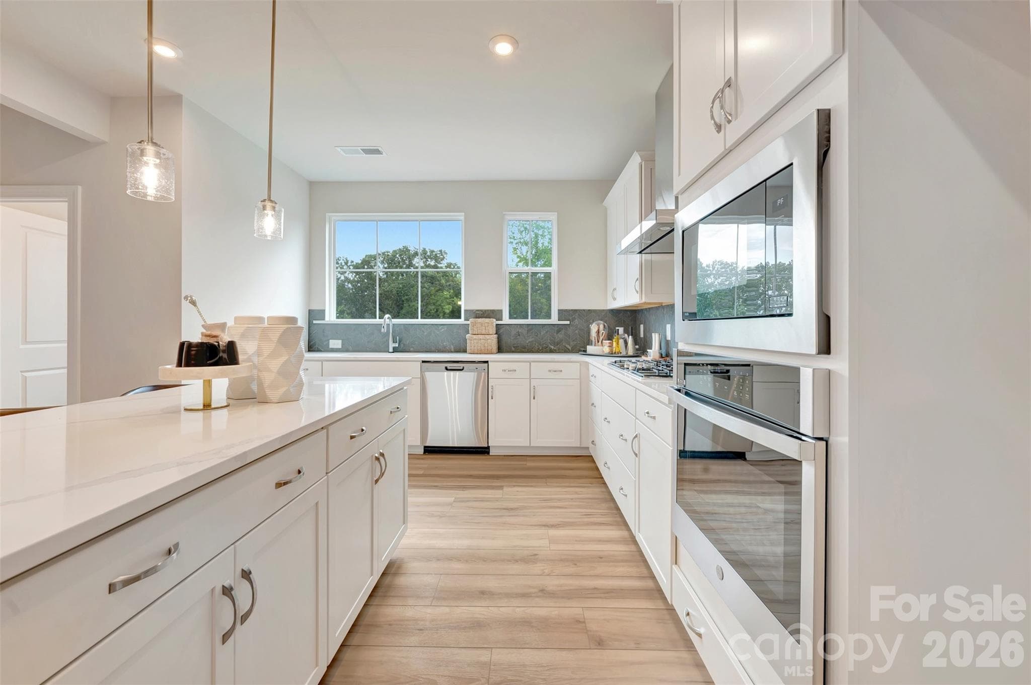 Gourmet kitchen with large windows - 309 Old Town Village Road, Waxhaw