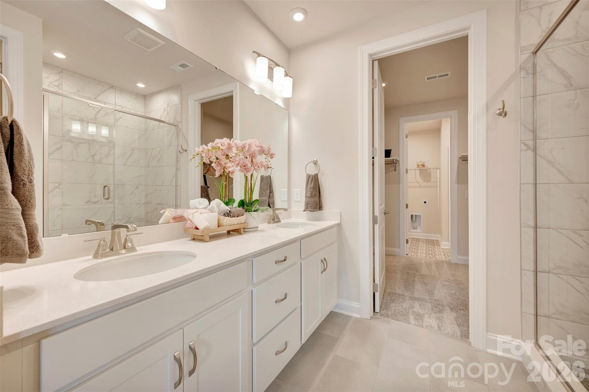 Dual vanity primary bathroom - 309 Old Town Village Road, Waxhaw