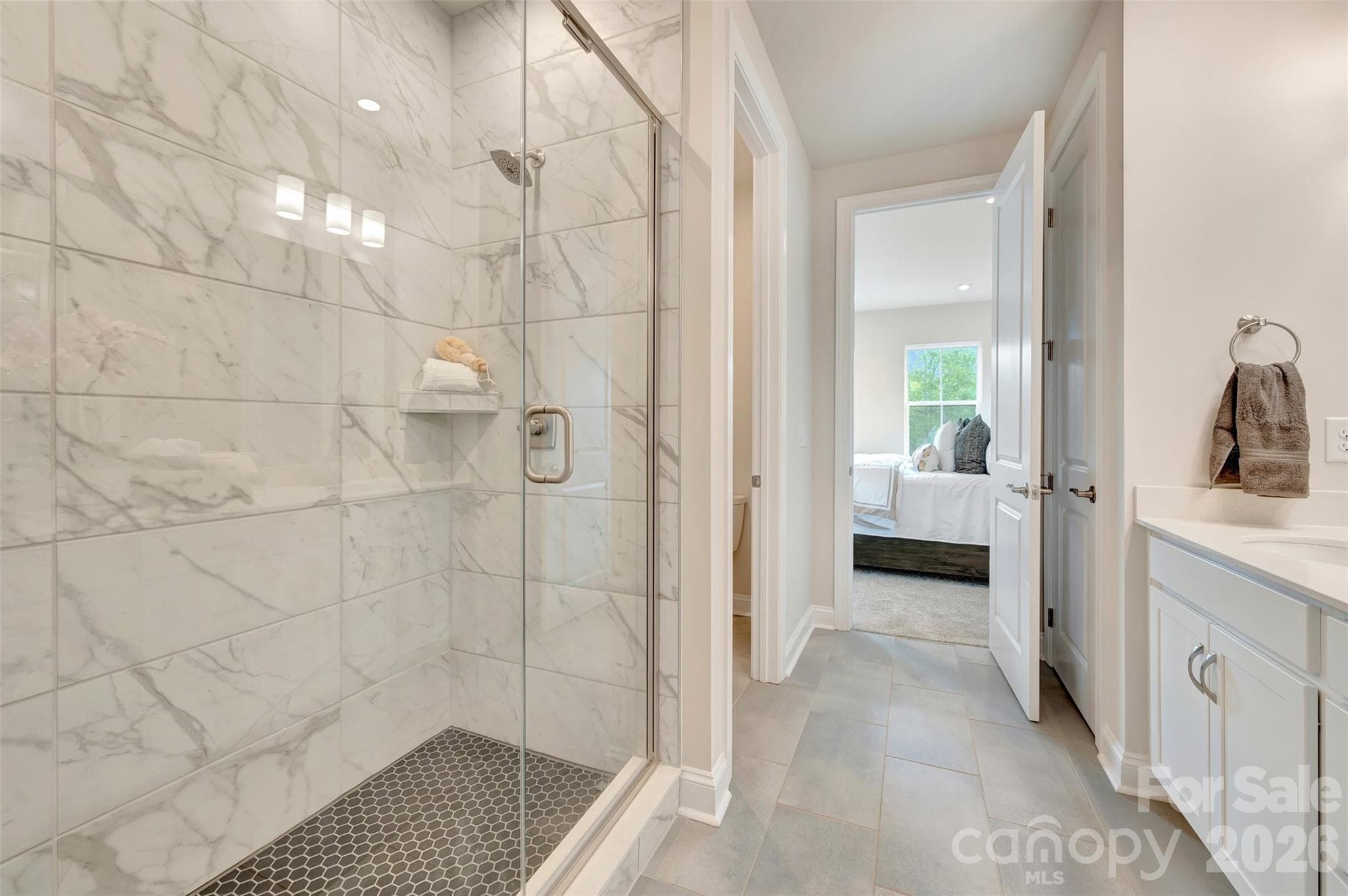 Primary bathroom with a a tiled walk-in shower - 309 Old Town Village Road, Waxhaw