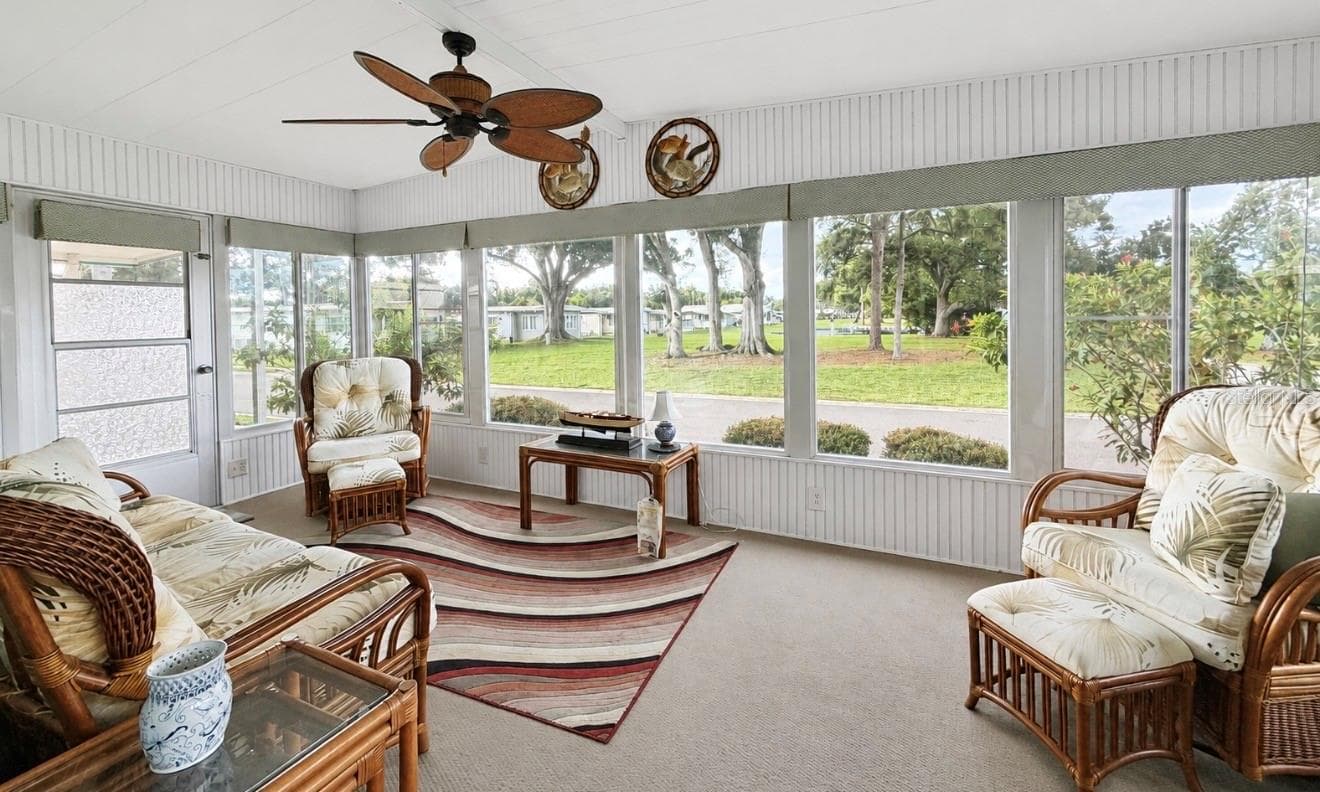 front Florida room over looks golf course view - 1100 BELCHER RD S #304, LARGO