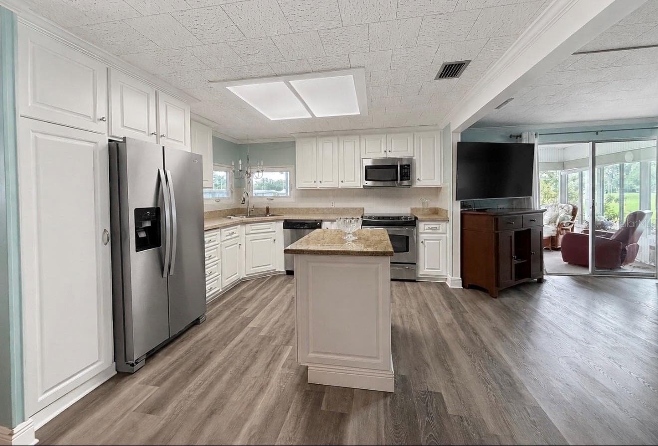 Kitchen  with stainless appliances - 1100 BELCHER RD S #304, LARGO