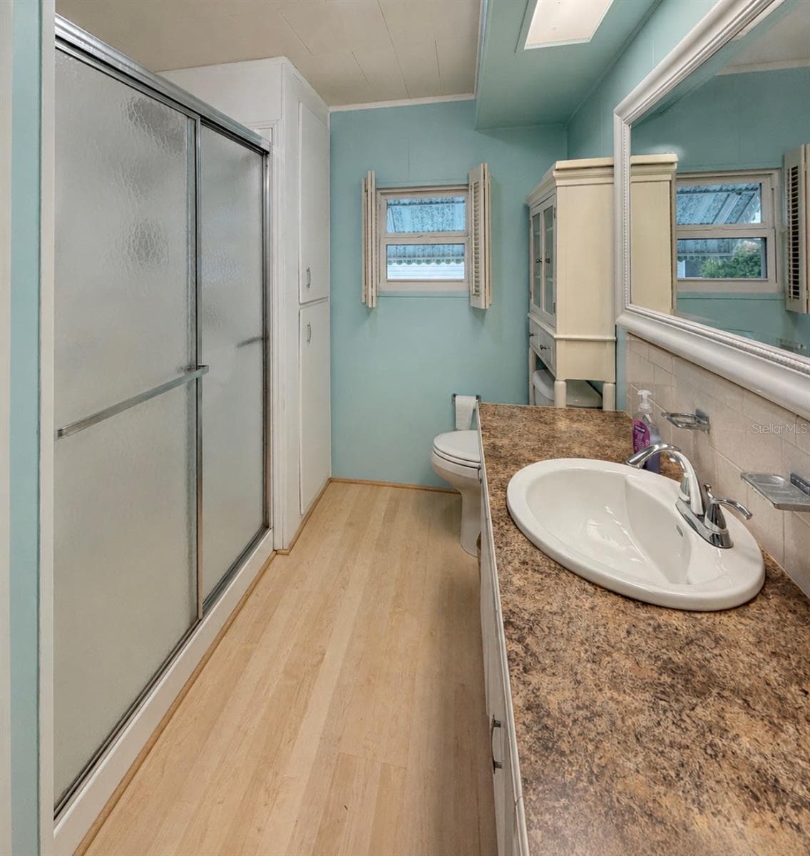 yPrimary bathroom with walk in shower - 1100 BELCHER RD S #304, LARGO
