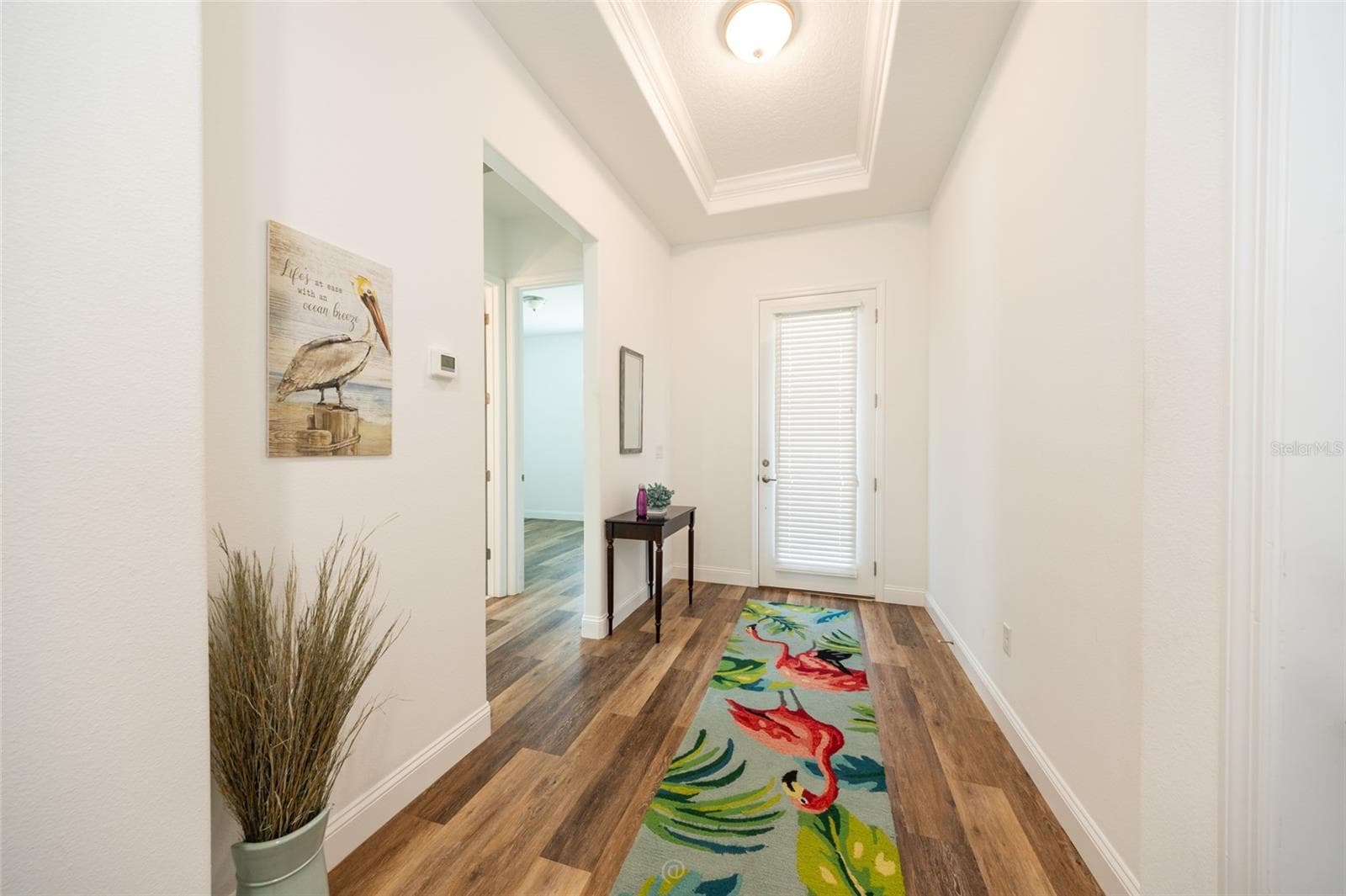 WELCOMING FOYER WITH BEAUTIFUL LPV FLOORING - 59 GREEN CIR, PALM COAST