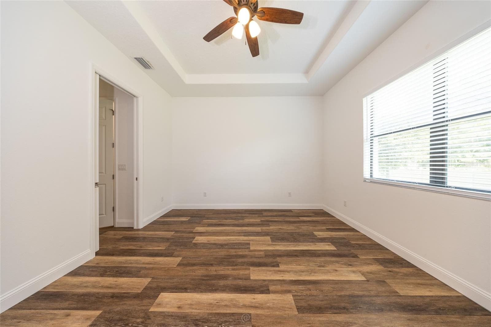 UNSTAGED PRIMARY BEDROOM - 59 GREEN CIR, PALM COAST
