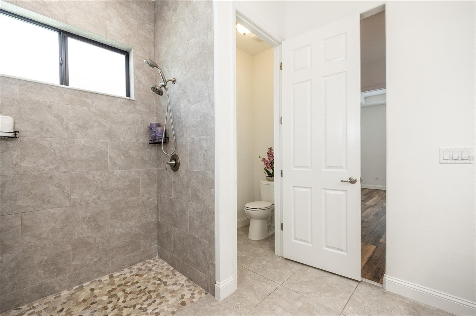 Private Toilet With Door In The Ensuite - 59 GREEN CIR, PALM COAST