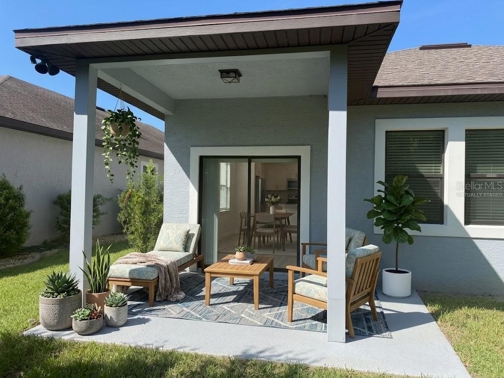 VIRTUALLY STAGED PATIO - 59 GREEN CIR, PALM COAST