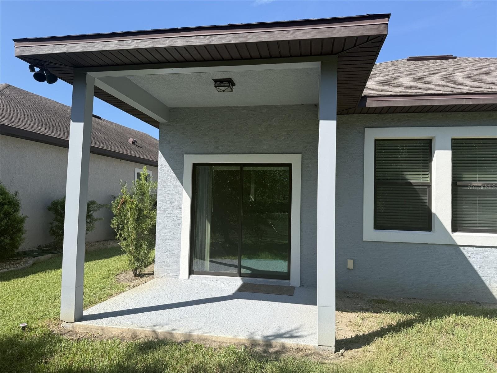 UNSTAGED PATIO - 59 GREEN CIR, PALM COAST