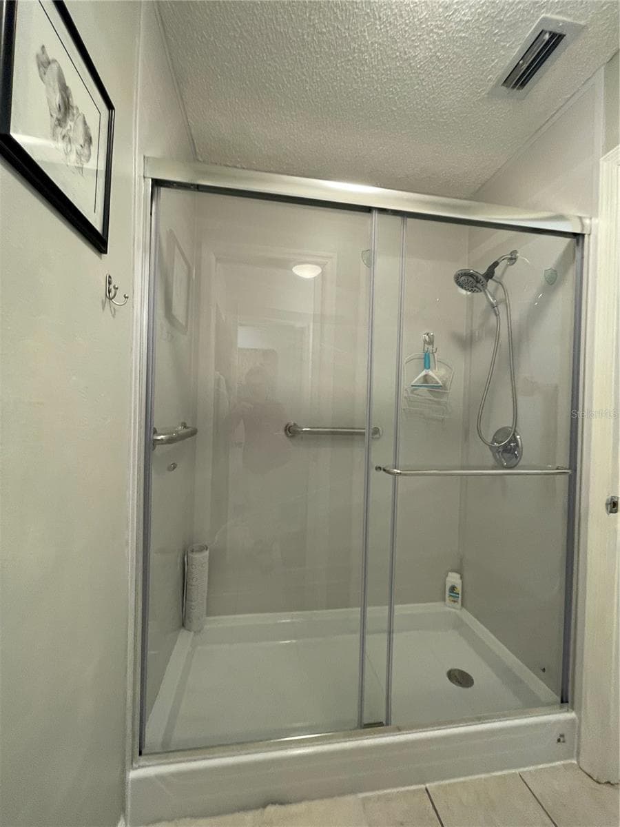 MASTER BATH STEP IN SHOWER - 255 BOUNDARY BLVD #104, ROTONDA WEST