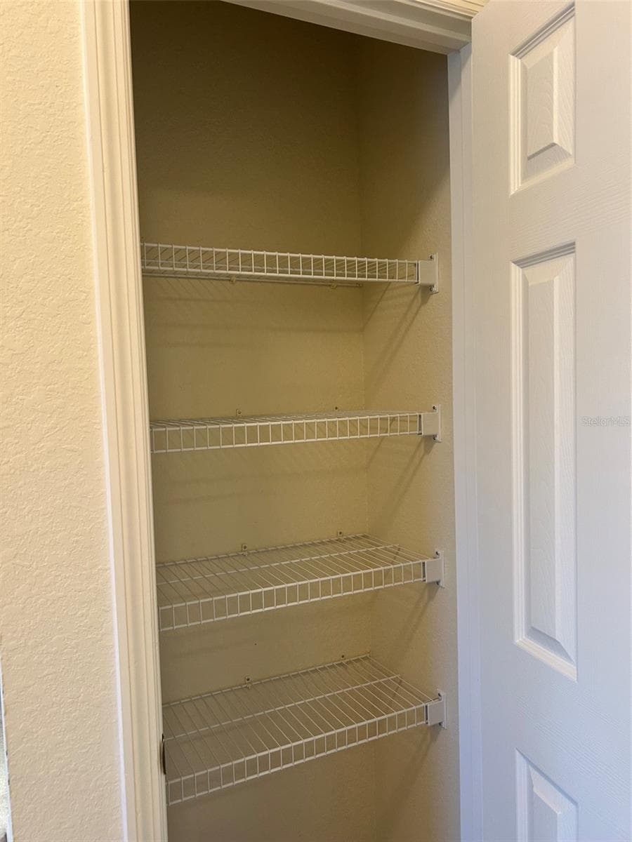 Primary Linen Closet - 508 EAGLE POND DR #508, WINTER HAVEN