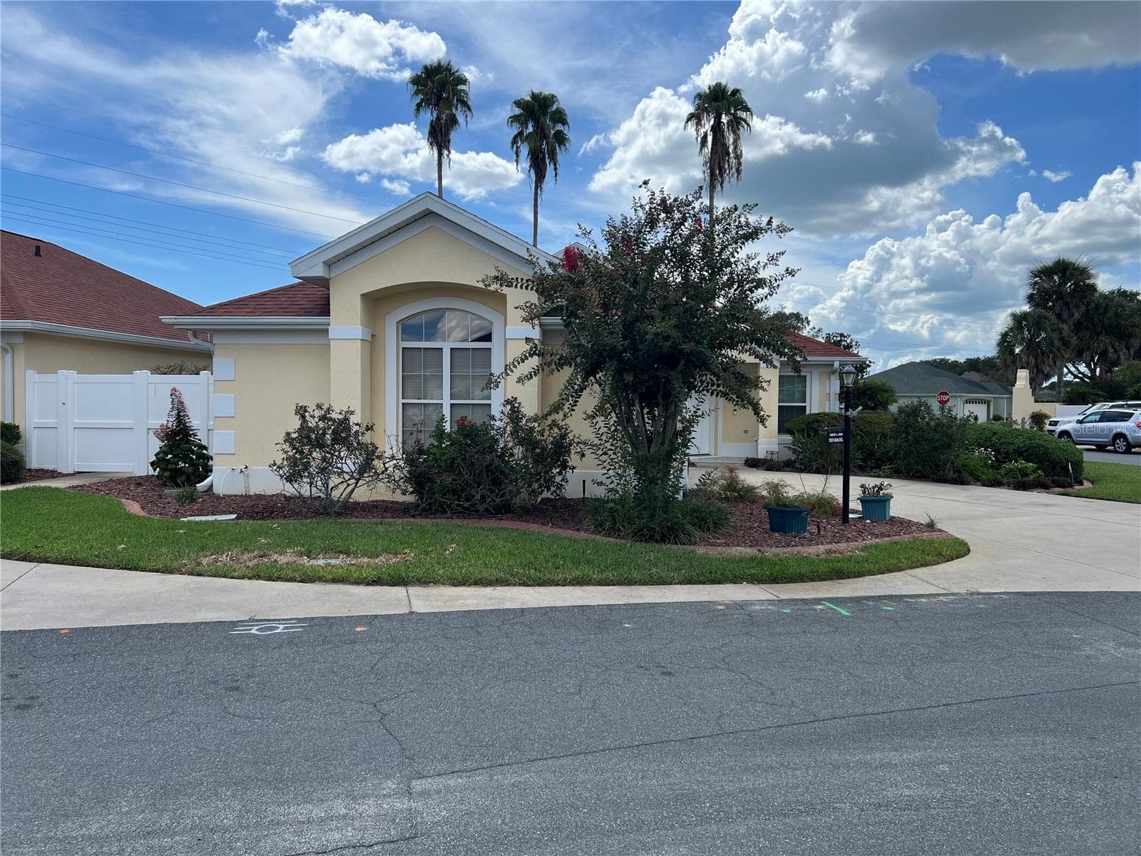 Street view of the Front of the Garage - 1842 PUERTO BELLO DR, THE VILLAGES