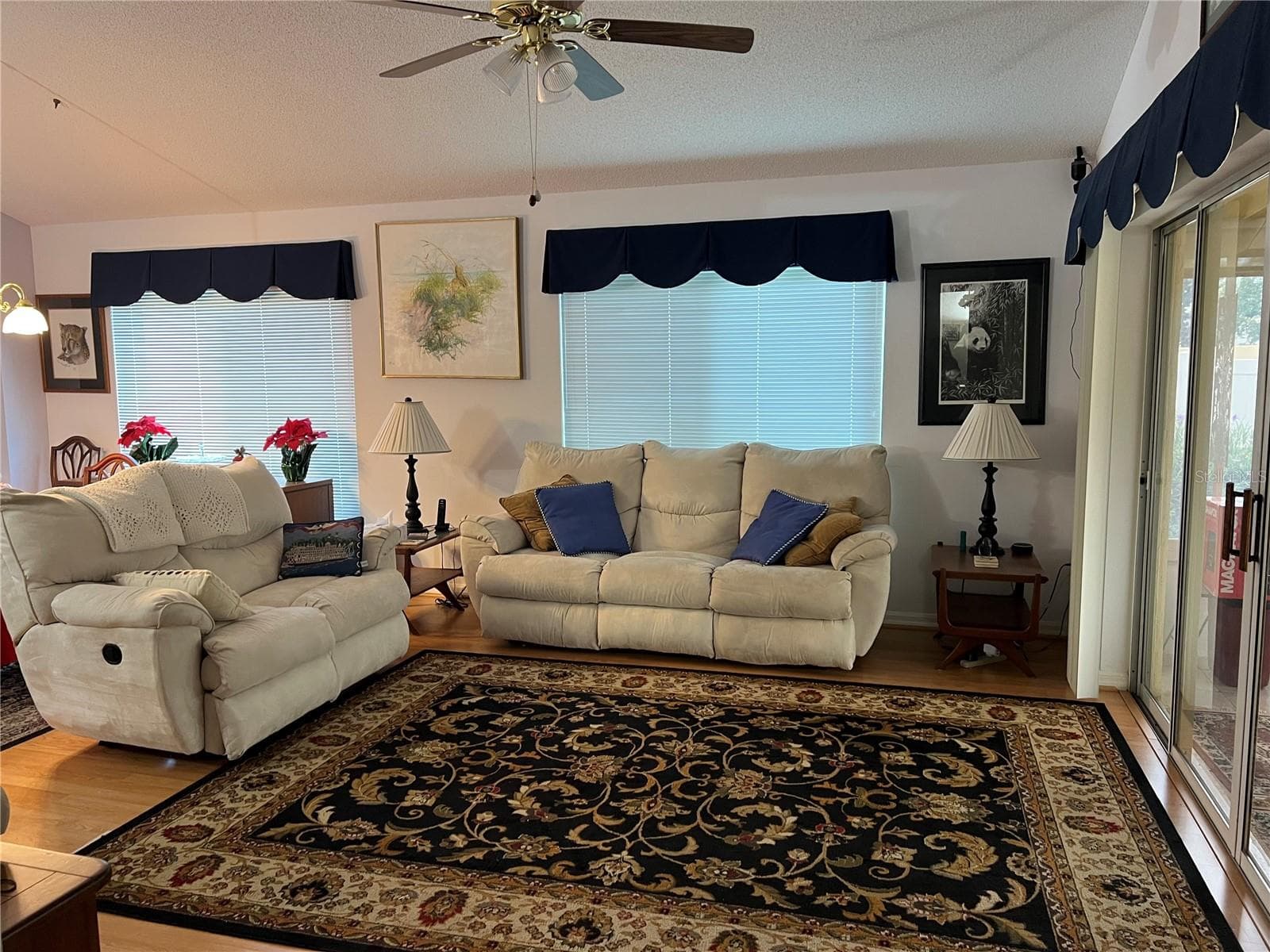 Living Room with Sliders to Covered Lanai - 1842 PUERTO BELLO DR, THE VILLAGES