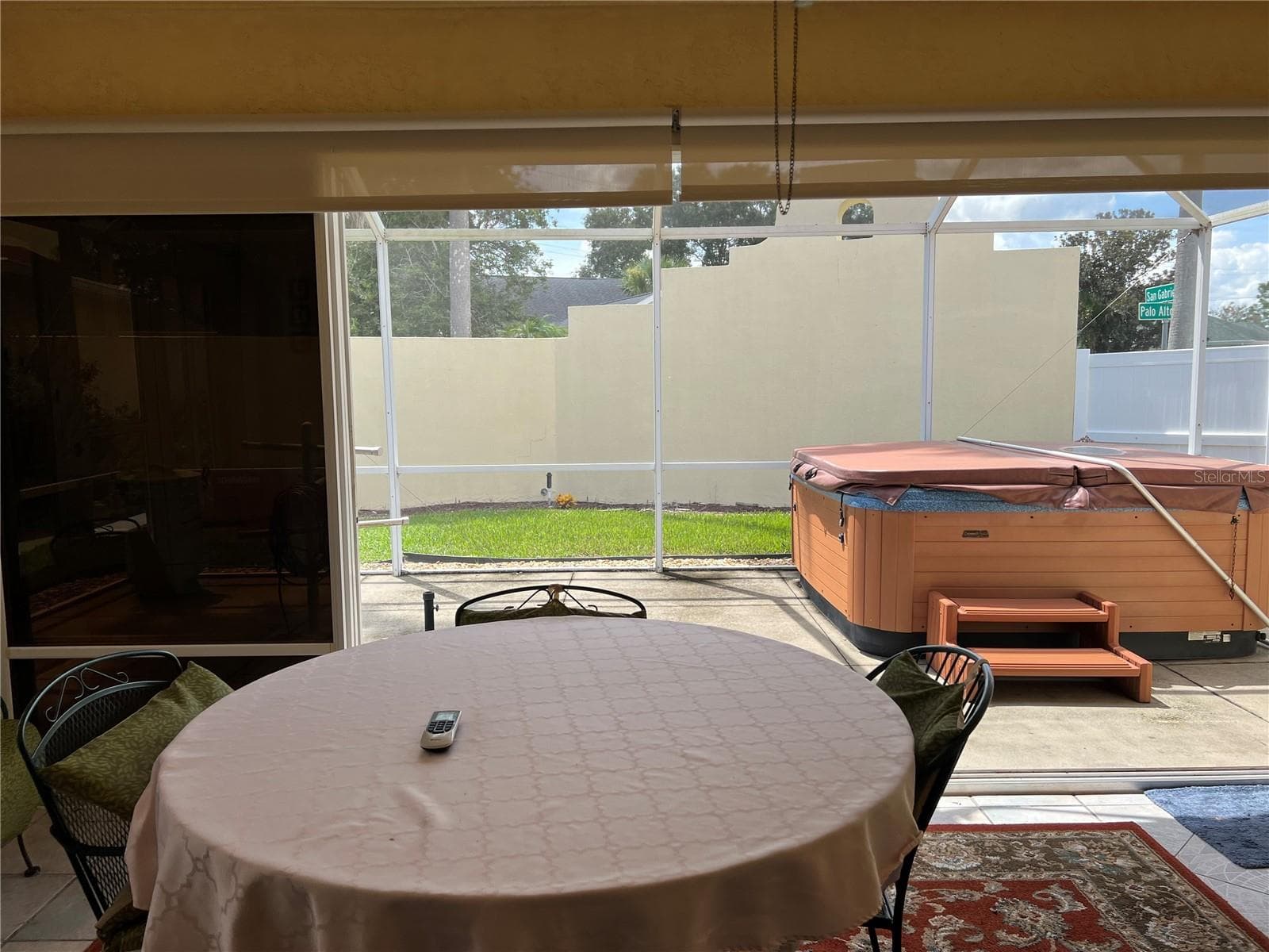 Enclosed Lanai with Collapsable Wall glass leading to screened patio with hot tub, indoor outdoor entertaining - 1842 PUERTO BELLO DR, THE VILLAGES
