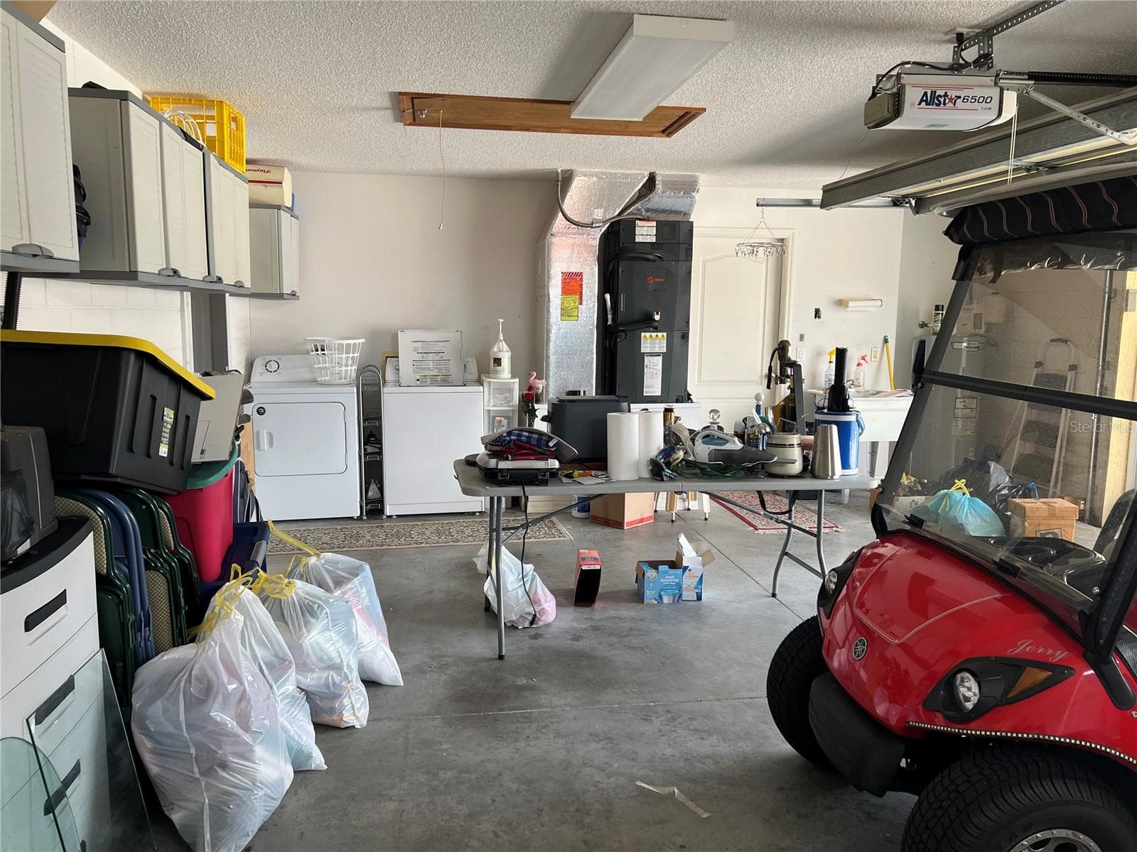 2 Car Garage with Laundry Area, HVAC, Utility Tub and Hot Water Heater - 1842 PUERTO BELLO DR, THE VILLAGES