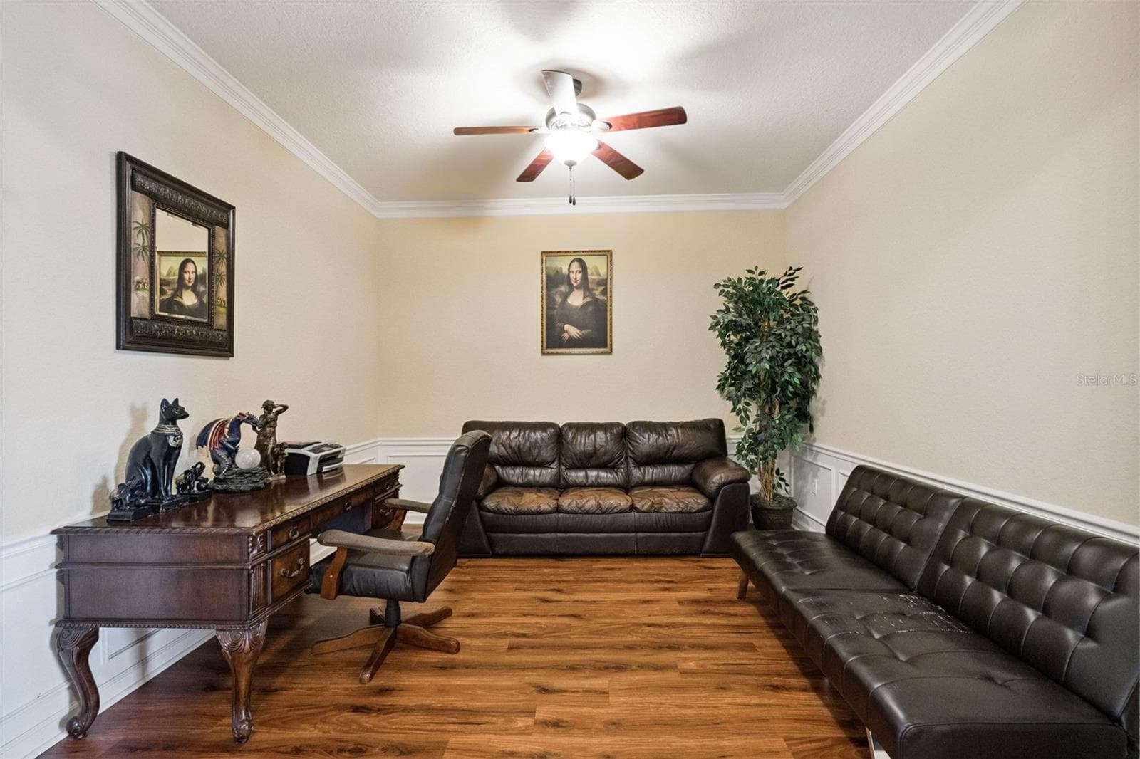 Formal Study Layout:Generous flex space ideal for a home office, den, or formal lounge, complete with crown molding and wainscoting details. - 4840 CAYVIEW AVE #405, ORLANDO