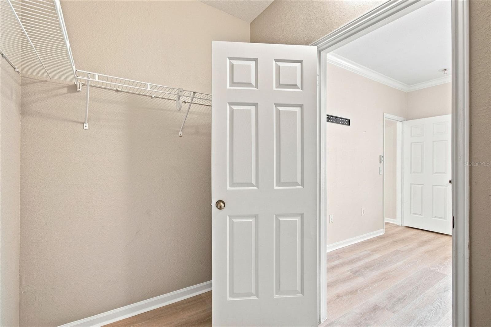 Walk-in Closet (primary) - 2151 CHIANTI PL #12-122, PALM HARBOR