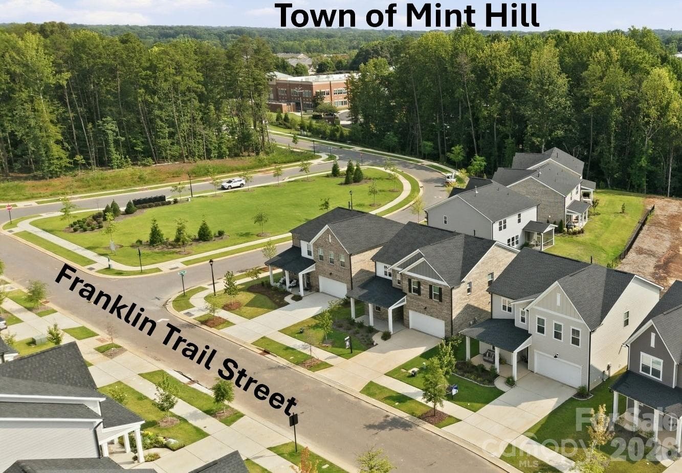 Green space for neighborhood with view toward nearby Mint Hill downtown area- - 8226 Franklin Trail Street, Mint Hill