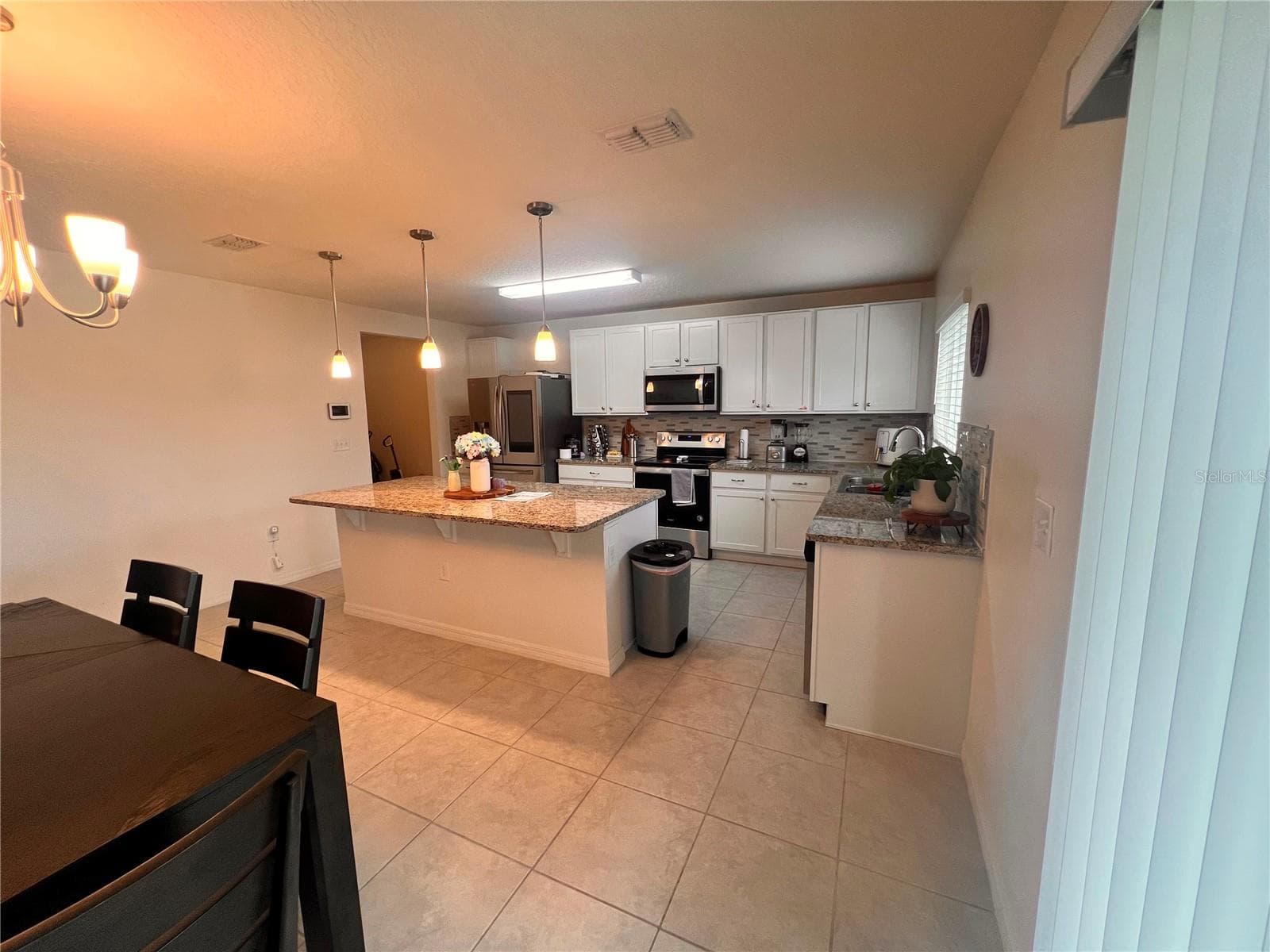 Single Family Residence at 3209 EAGLE HAMMOCK CIR, KISSIMMEE, photo 6 of 18
