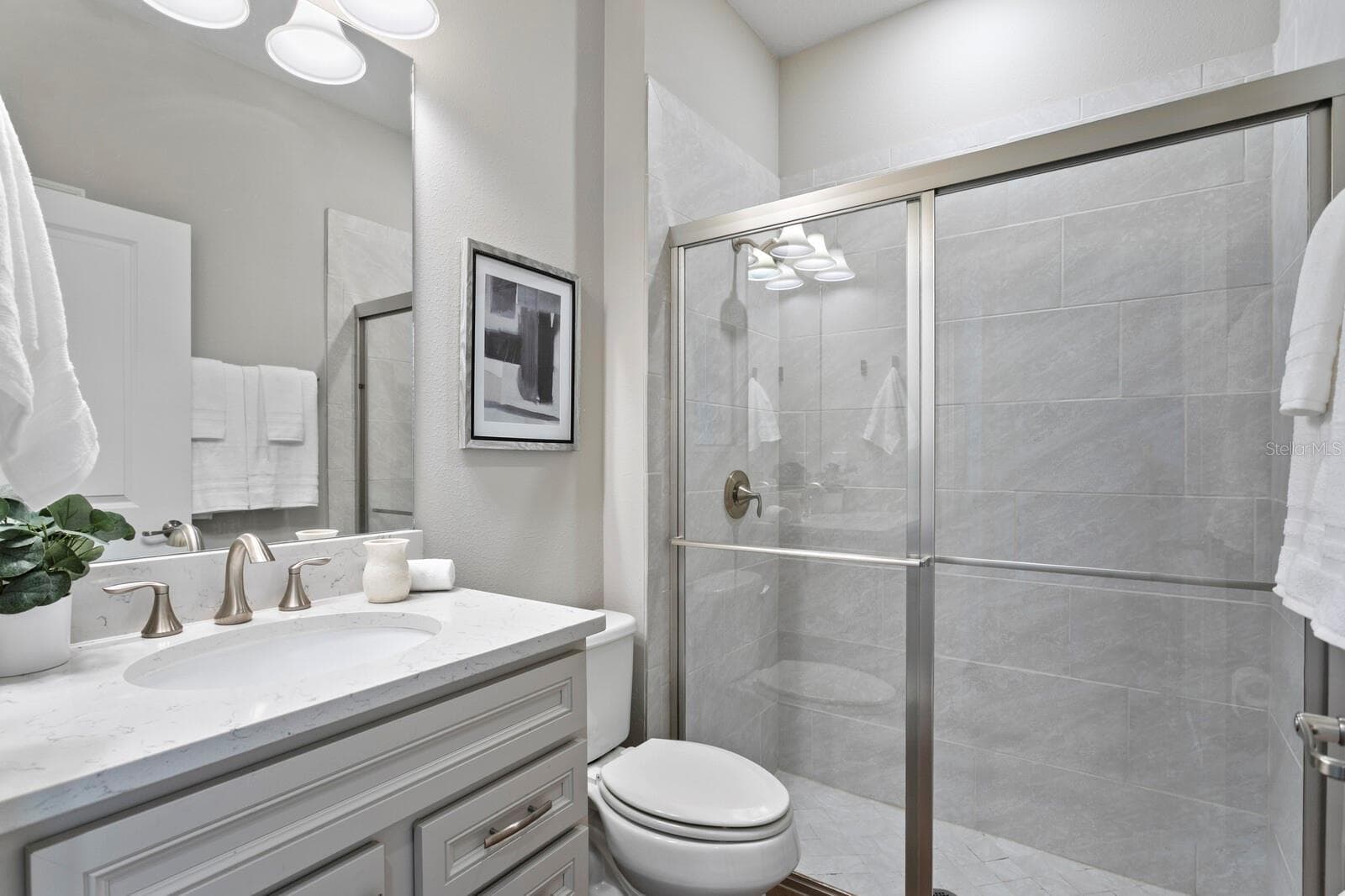 1st floor second full bath with walk-in-shower & quartz counters - 18908 WILLOWMORE CEDAR DR, LUTZ