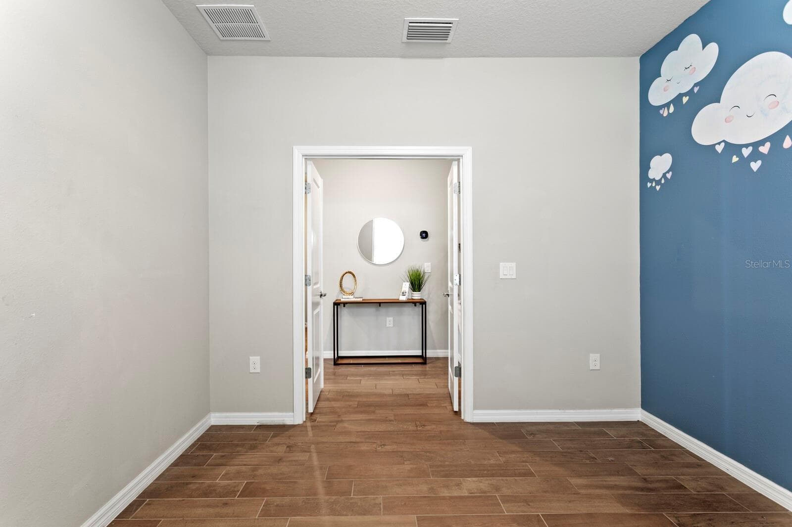 French doors into private home office space - 18908 WILLOWMORE CEDAR DR, LUTZ