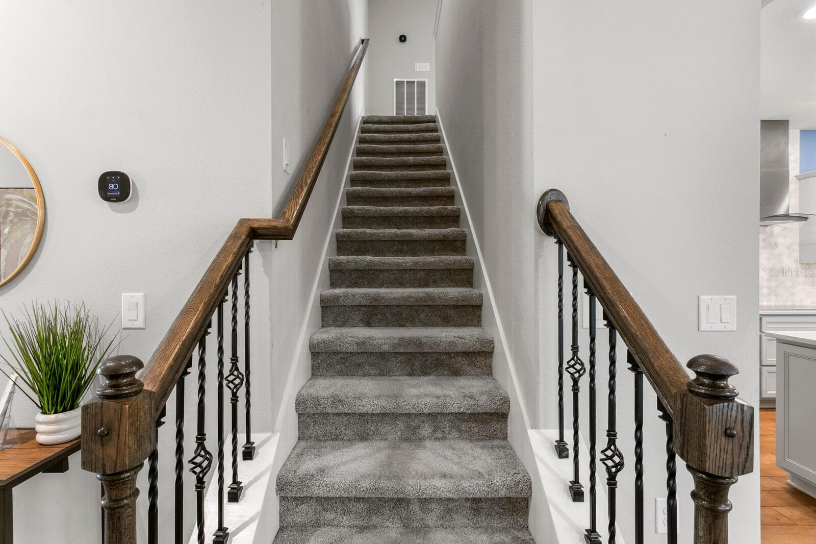 Upgraded stairway leads to 2nd floor bonus room - 18908 WILLOWMORE CEDAR DR, LUTZ
