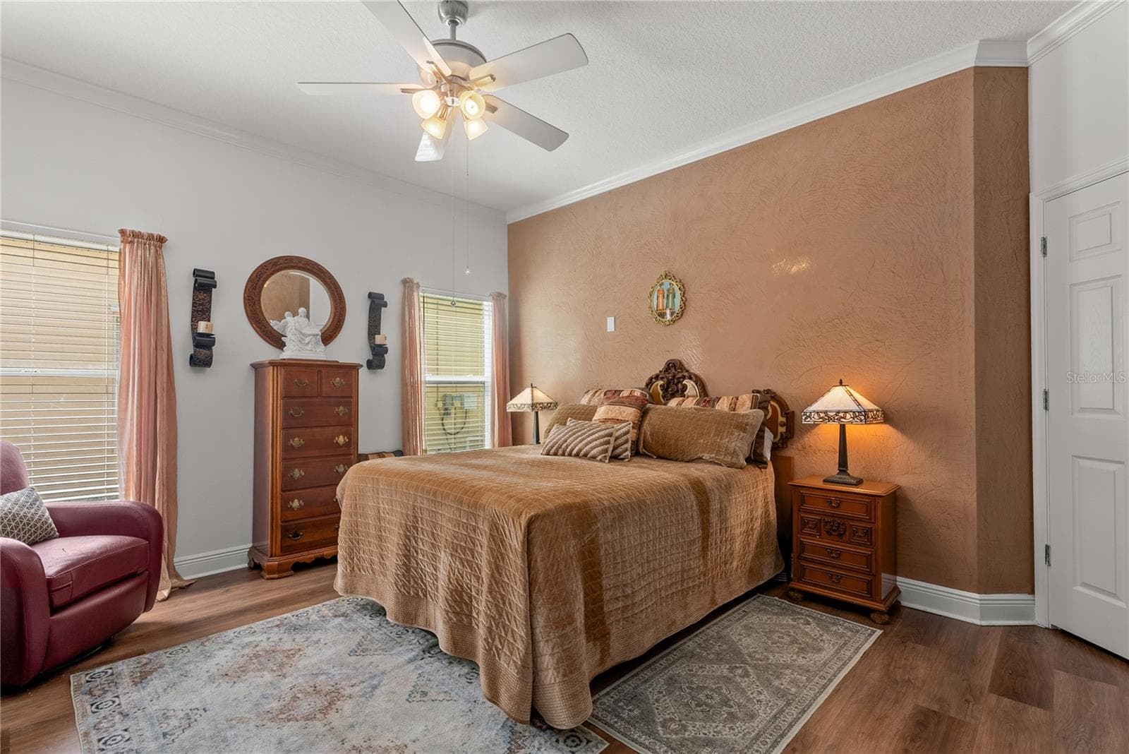Primary bedroom with a large walk-in closet. - 11326 BLUE SAGE PL, LAKEWOOD RANCH