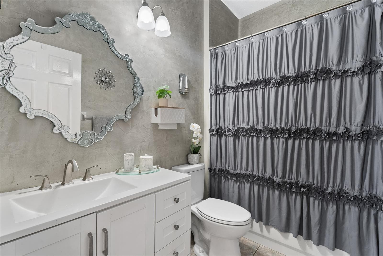 Guest bathroom. New vanity and commode. - 11326 BLUE SAGE PL, LAKEWOOD RANCH