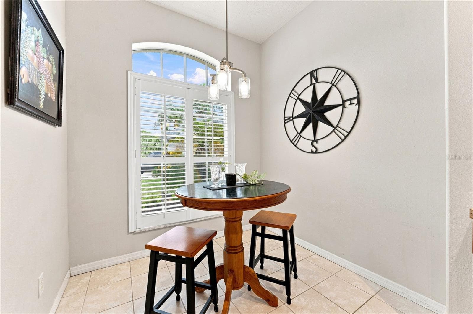 Eat in area with plantation shutters - 491 BRILAND ST, TARPON SPRINGS