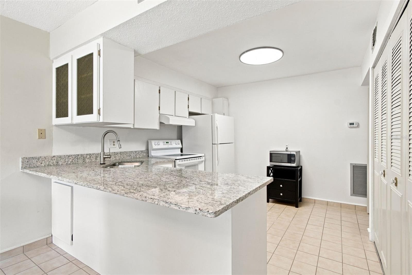 Condominium at 1655 S HIGHLAND AVE #B110, CLEARWATER, photo 24 of 100