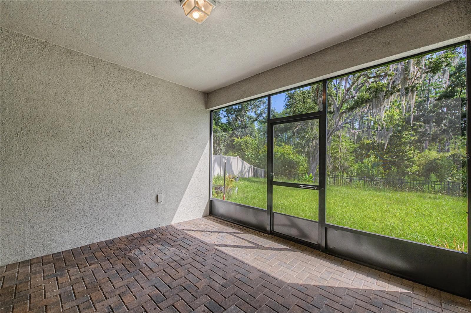 Screened In Back Patio - 9826 CARABINER WAY, LAND O LAKES