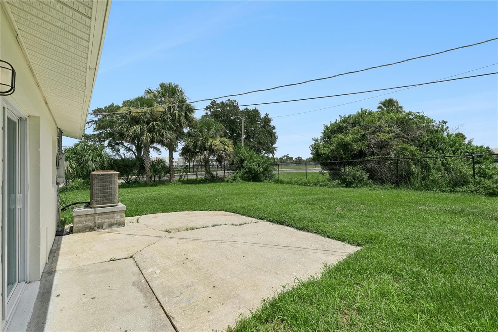 Patio Overlooking Oversized Backyard - 875 LOOMIS AVE, DAYTONA BEACH