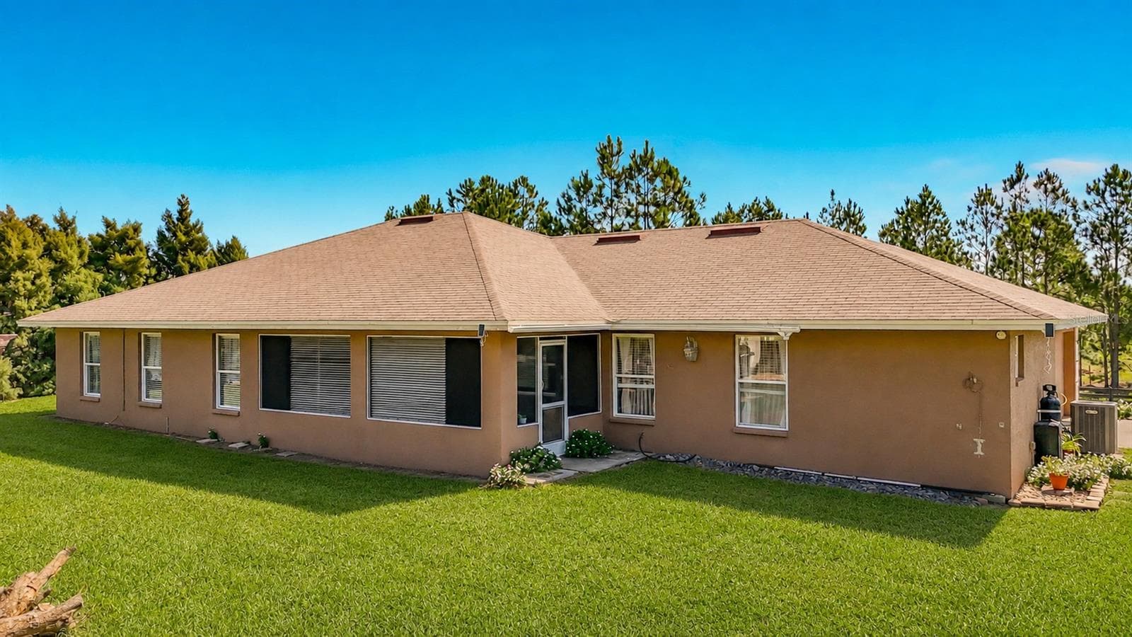 Check out the back of the house. - 18030 BAYAMON AVE, POLK CITY