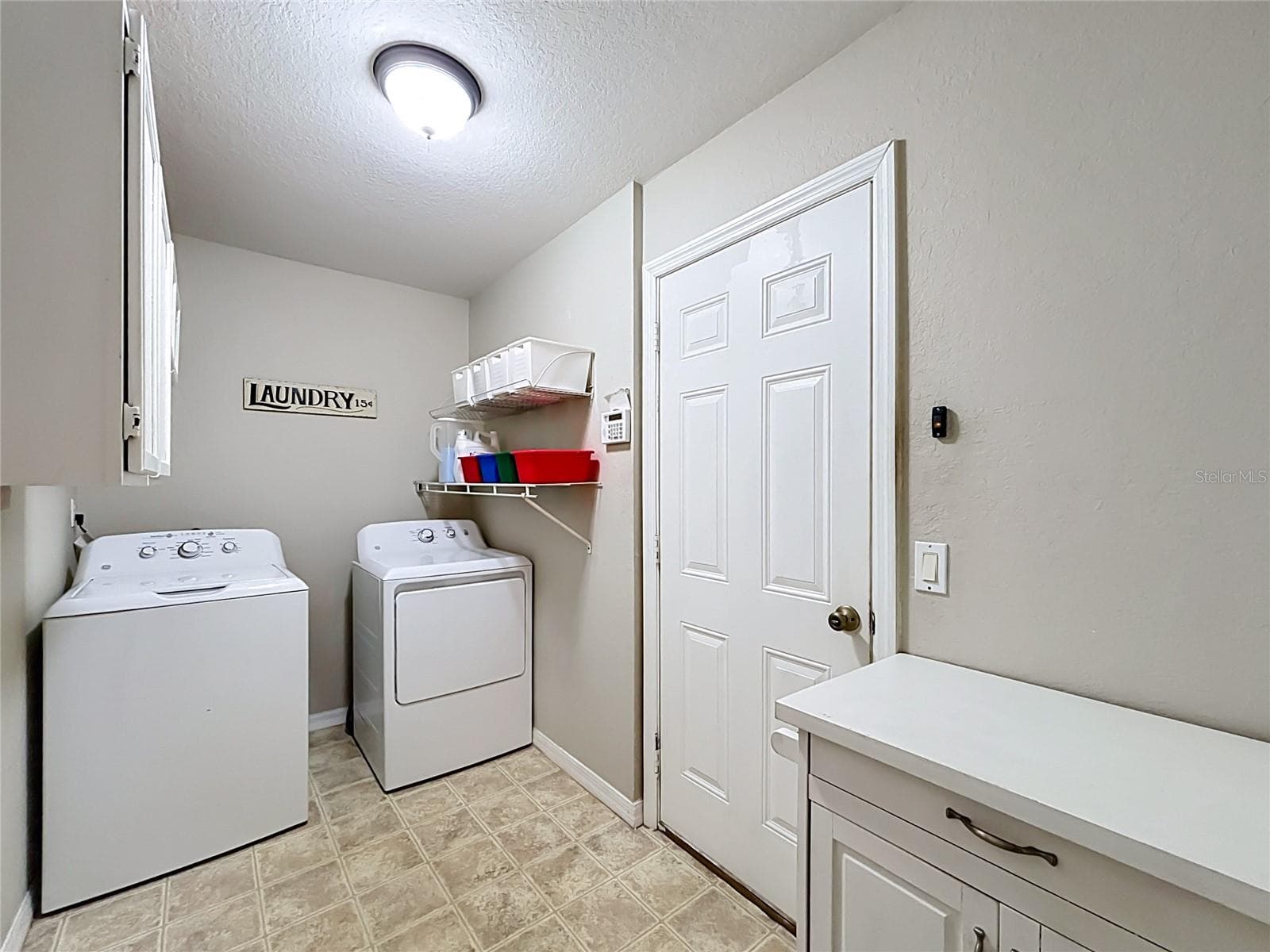 Laundry room - 18030 BAYAMON AVE, POLK CITY