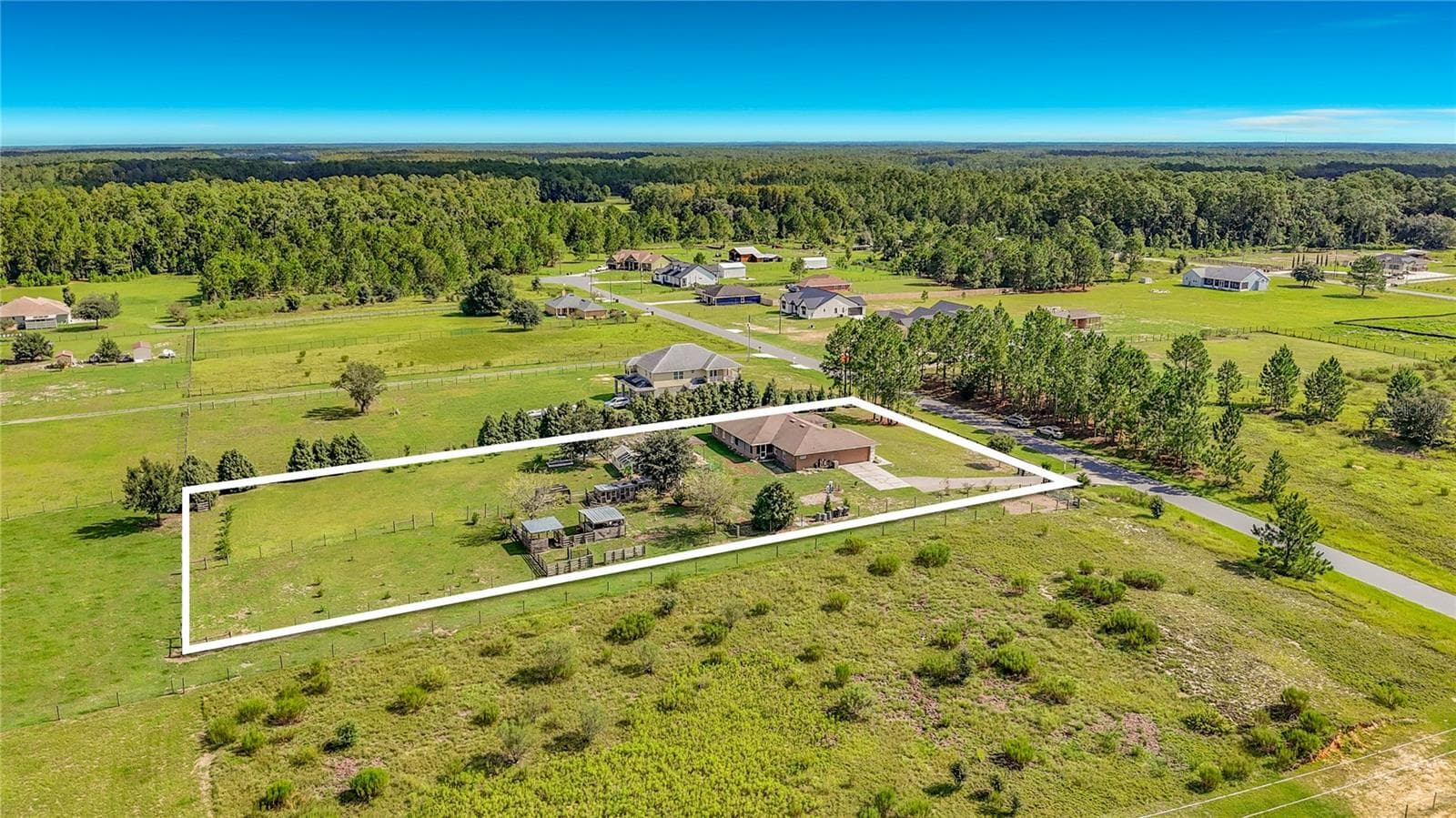 I am 1.40 acres. Left side there is an ingress easement beyond the white line. - 18030 BAYAMON AVE, POLK CITY