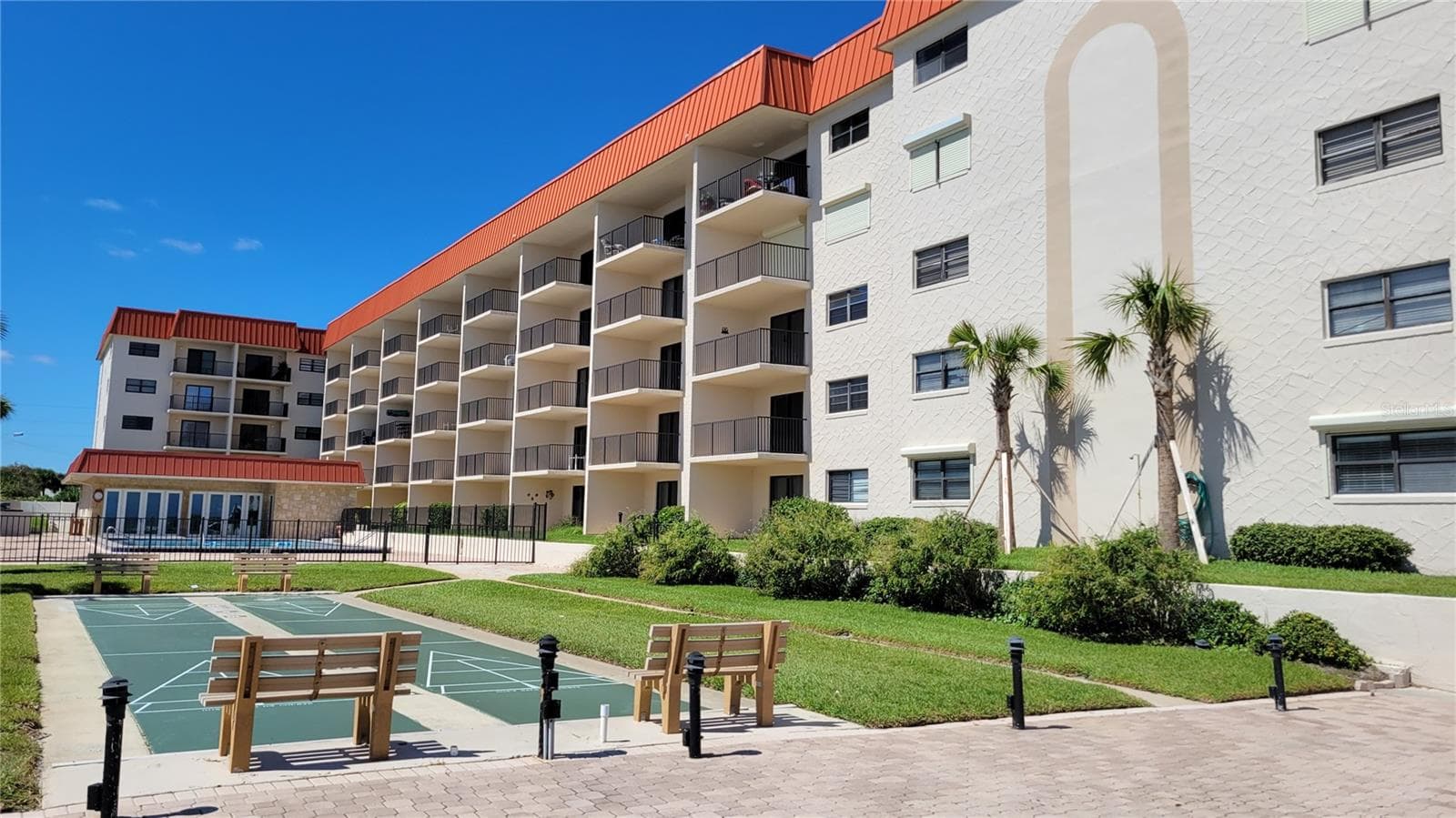 Hacienda Del Sol II poolside on ocean. - 4301 S ATLANTIC AVE #504, NEW SMYRNA BEACH