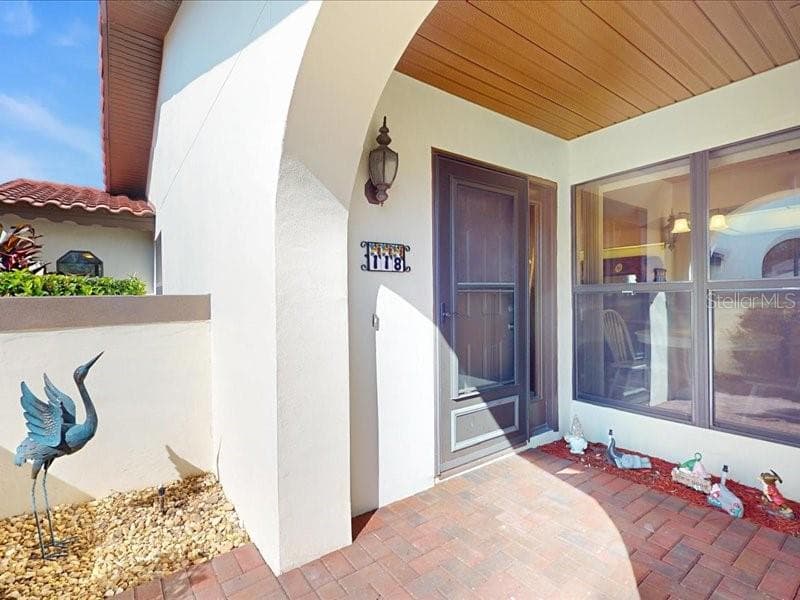 Covered entrance - 118 COVENTRY LN, HAINES CITY