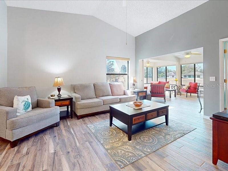 As you enter the front door you have the main living area and can look straight out to the back. - 118 COVENTRY LN, HAINES CITY