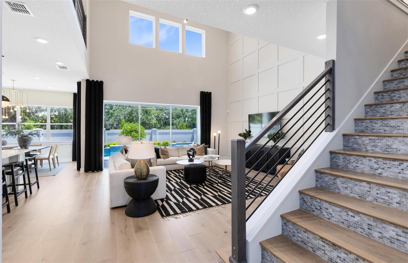 Actual home photo. Colors, finishes, textures and options may appear differently in person due to variations in monitors and viewing devices. - 16920 LONE OAK CIRCLE, ORLANDO