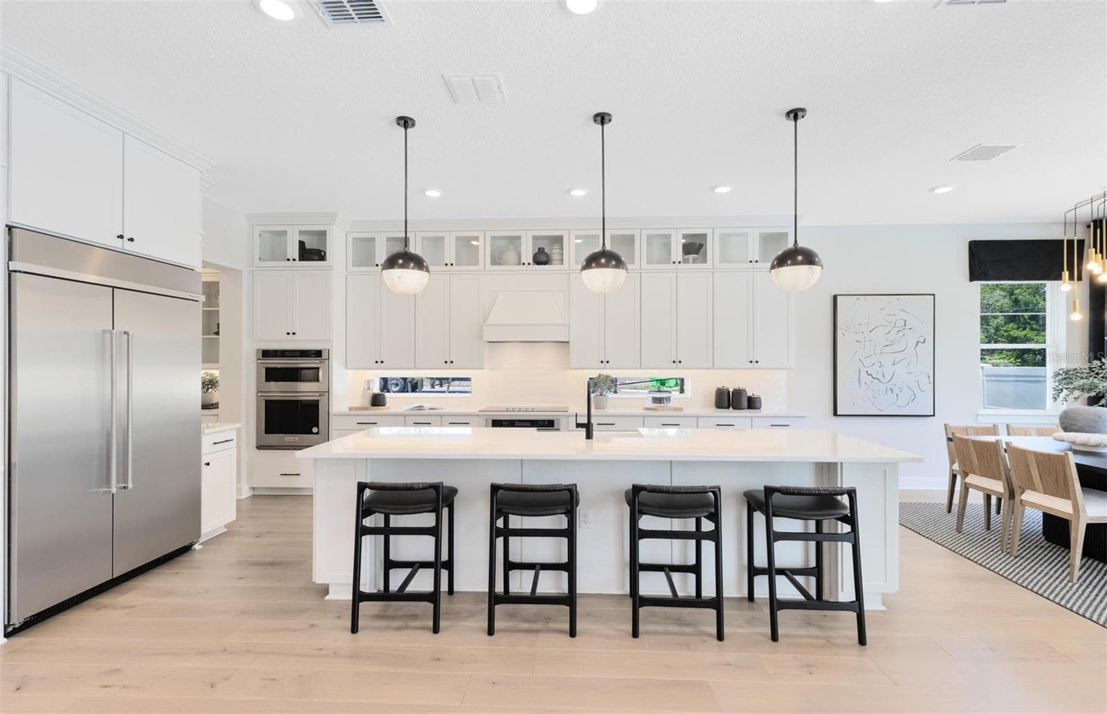 Actual home photo. Colors, finishes, textures and options may appear differently in person due to variations in monitors and viewing devices. - 16920 LONE OAK CIRCLE, ORLANDO
