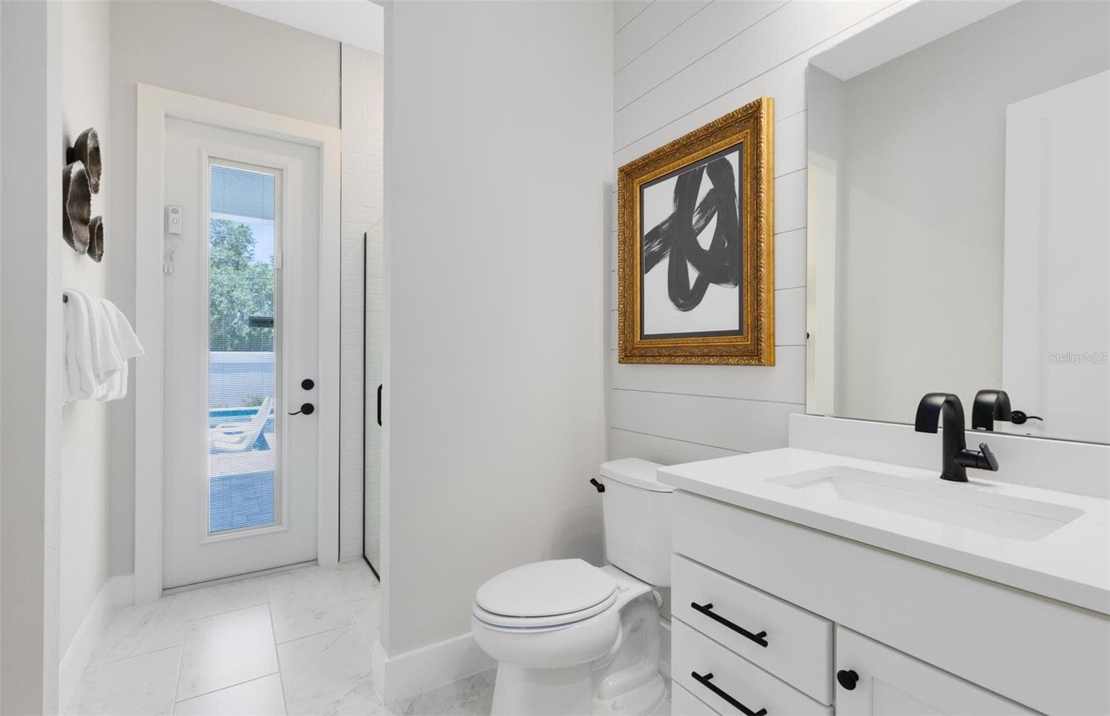 Actual home photo. Colors, finishes, textures and options may appear differently in person due to variations in monitors and viewing devices. - 16920 LONE OAK CIRCLE, ORLANDO
