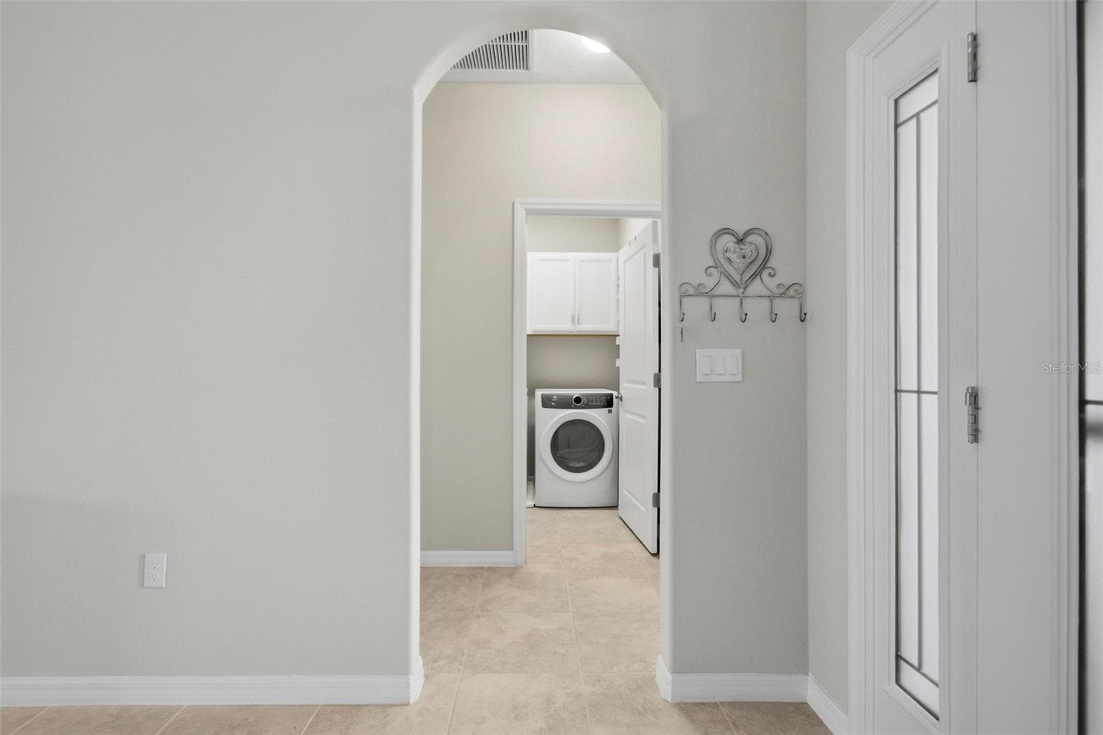 view of hallway to laundry room - 7 TIDEWAY TRL, PALM COAST
